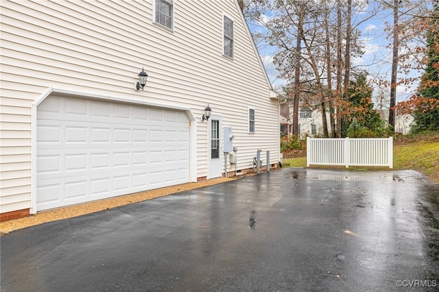 14313 Woodleigh Dr, Chester, VA 23831 - view of home's exterior featuring driveway and a garage