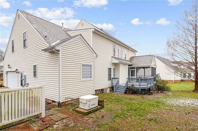 14313 Woodleigh Dr, Chester, VA 23831 - back of house featuring a deck, a garage, and a shingled roof