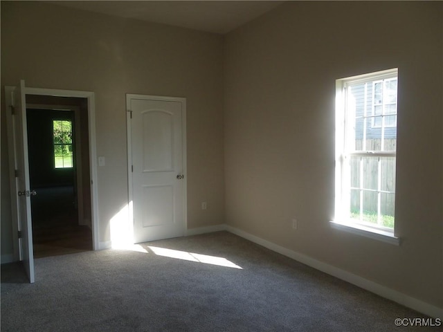 1120 Halifax St, Petersburg, VA 23803 - spare room featuring carpet floors and baseboards