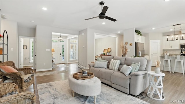 5080 Brandon Pines Way, Providence Forge, VA 23140 - living area featuring light wood-style floors, a chandelier, a ceiling fan, and recessed lighting