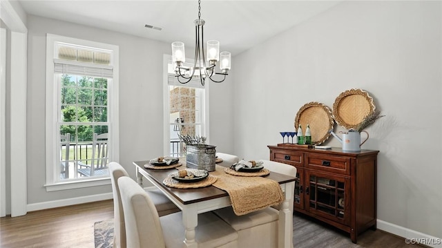 5080 Brandon Pines Way, Providence Forge, VA 23140 - dining room with a chandelier, wood finished floors, and plenty of natural light