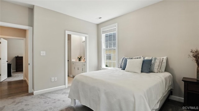 5080 Brandon Pines Way, Providence Forge, VA 23140 - carpeted bedroom featuring baseboards and ensuite bathroom