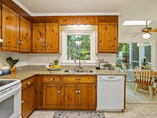 14107 Laurel Trail Pl, Midlothian, VA 23112 - kitchen with white appliances, brown cabinets, a ceiling fan, and healthy amount of natural light