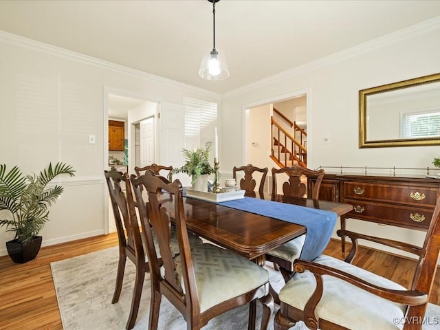 14107 Laurel Trail Pl, Midlothian, VA 23112 - dining room with light wood-style flooring, ornamental molding, and stairway