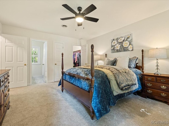 14107 Laurel Trail Pl, Midlothian, VA 23112 - carpeted bedroom with ceiling fan, a walk in closet, and a closet