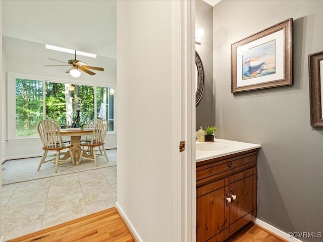 14107 Laurel Trail Pl, Midlothian, VA 23112 - bathroom with healthy amount of natural light, vanity, and a ceiling fan
