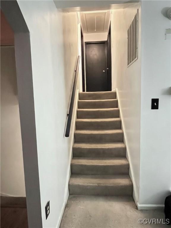 4009 Robert E Lee Dr, North Prince George, VA 23860 - staircase featuring attic access and arched walkways
