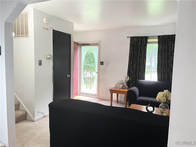 4009 Robert E Lee Dr, North Prince George, VA 23860 - living area with plenty of natural light, stairs, and carpet