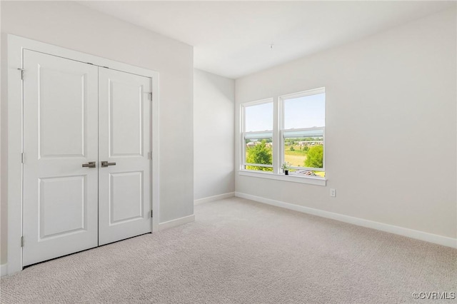 3900 Maze Runner Dr Unit 205, Chesterfield, VA 23112 - unfurnished bedroom with carpet floors and a closet