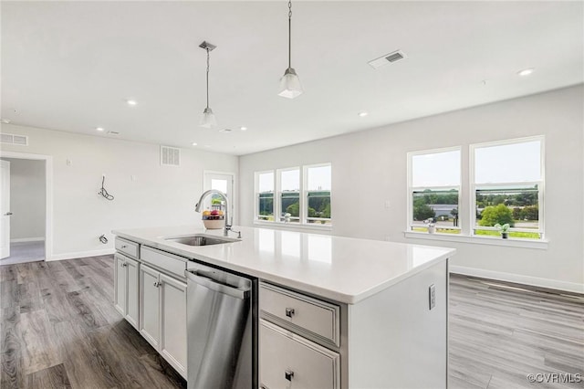 3900 Maze Runner Dr Unit 205, Chesterfield, VA 23112 - kitchen featuring stainless steel dishwasher, recessed lighting, a kitchen island with sink, light countertops, and decorative light fixtures