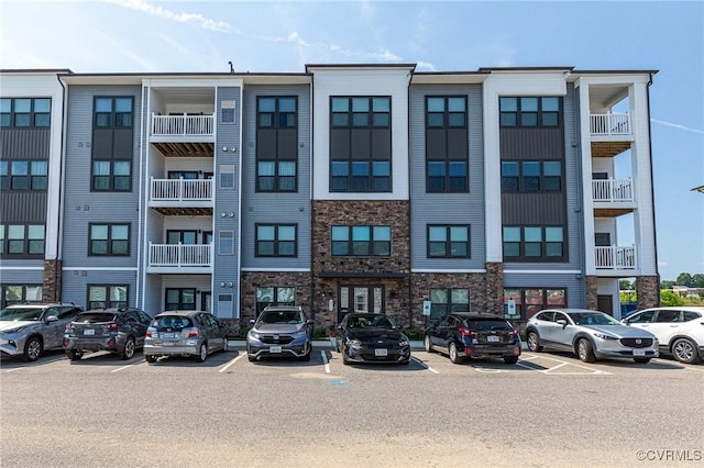 3900 Maze Runner Dr Unit 205, Chesterfield, VA 23112 - view of building exterior featuring uncovered parking
