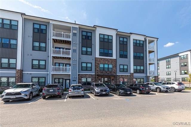 3900 Maze Runner Dr Unit 205, Chesterfield, VA 23112 - view of building exterior with uncovered parking