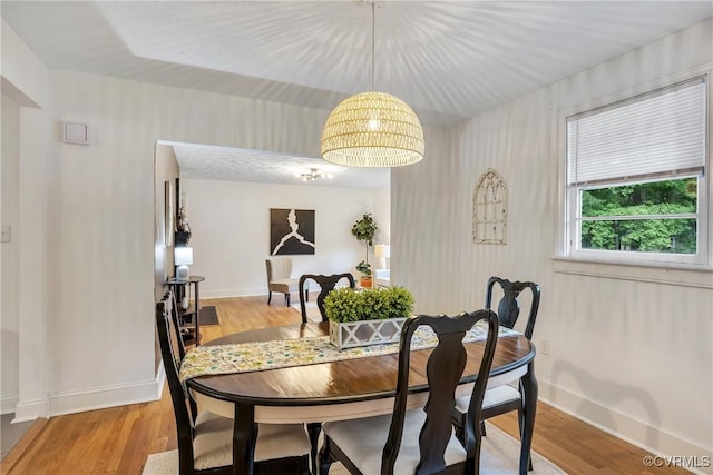 520 Heth Rd, Petersburg, VA 23805 - dining area with light wood-style floors and a chandelier