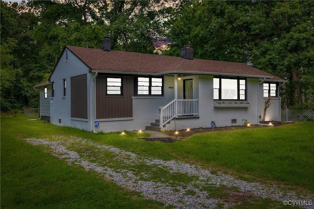 520 Heth Rd, Petersburg, VA 23805 - view of front of property featuring a chimney, a front lawn, and roof with shingles