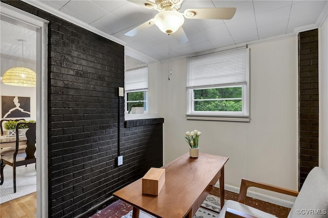 520 Heth Rd, Petersburg, VA 23805 - office area with crown molding, light wood-type flooring, ceiling fan, and brick wall