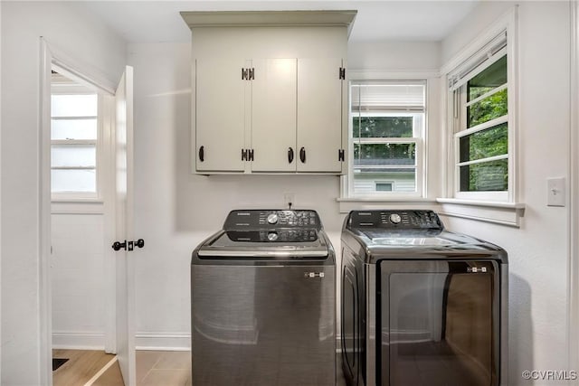 520 Heth Rd, Petersburg, VA 23805 - washroom with cabinet space and washer and clothes dryer