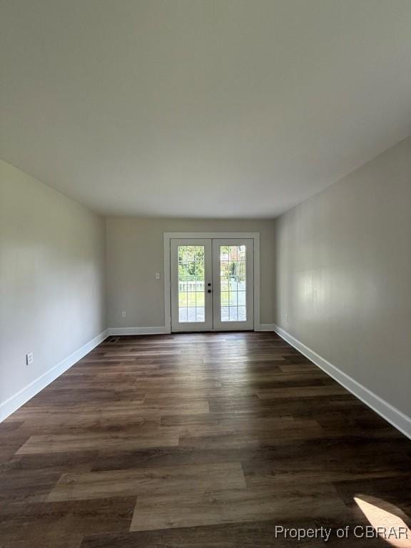 36 Roseneath Ave, Kilmarnock, VA 22482 - empty room featuring french doors and dark wood-style floors