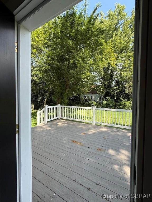 36 Roseneath Ave, Kilmarnock, VA 22482 - wooden terrace with view of wooded area
