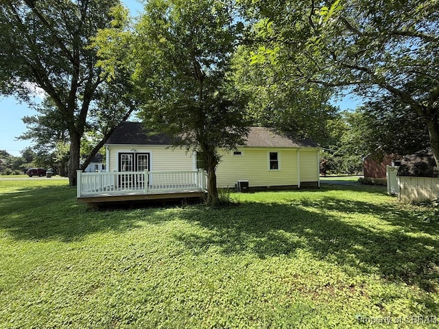 36 Roseneath Ave, Kilmarnock, VA 22482 - rear view of house with a deck and a yard