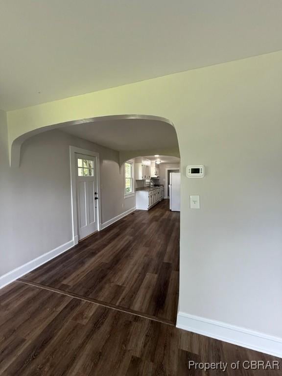 36 Roseneath Ave, Kilmarnock, VA 22482 - entrance foyer with arched walkways and dark wood finished floors