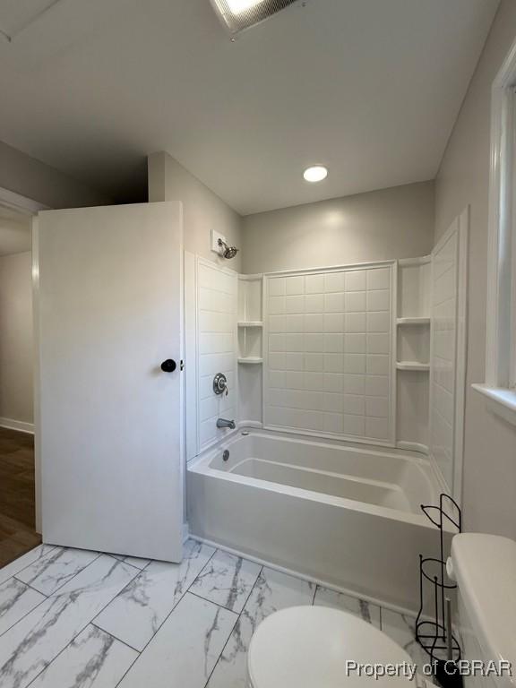 36 Roseneath Ave, Kilmarnock, VA 22482 - bathroom featuring recessed lighting, bathing tub / shower combination, and marble look tile flooring