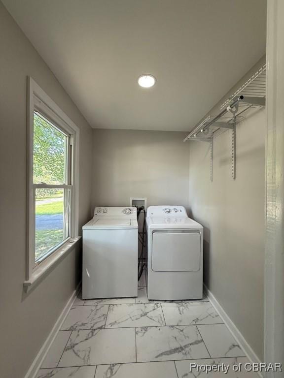 36 Roseneath Ave, Kilmarnock, VA 22482 - washroom with washing machine and clothes dryer, recessed lighting, and light marble finish floors