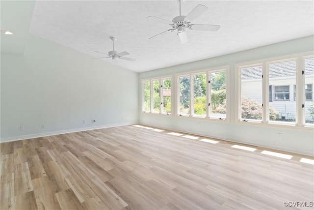 2411 Colwyn Rd, Henrico, VA 23229 - empty room featuring a ceiling fan, light wood-style flooring, and vaulted ceiling