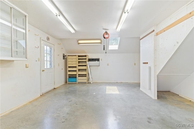 2411 Colwyn Rd, Henrico, VA 23229 - garage featuring a wall mounted air conditioner