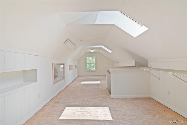 2411 Colwyn Rd, Henrico, VA 23229 - bonus room with a skylight, lofted ceiling, and light wood-style floors