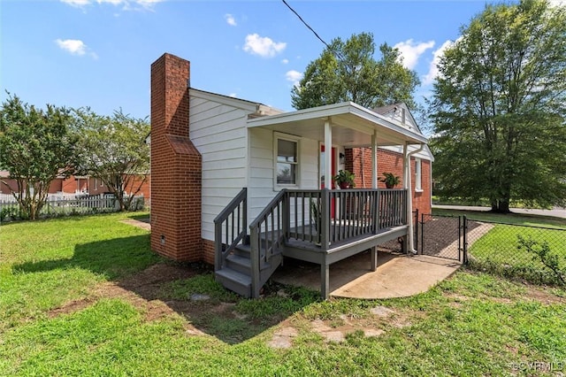 2000 Cleary Rd, Richmond, VA 23223 - view of front of house with a chimney, a gate, and a porch