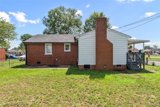 2000 Cleary Rd, Richmond, VA 23223 - back of property with crawl space and a chimney