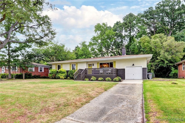 107 Ward, Hampton, VA 23669 - single story home with an attached garage, a chimney, a front lawn, driveway, and brick siding