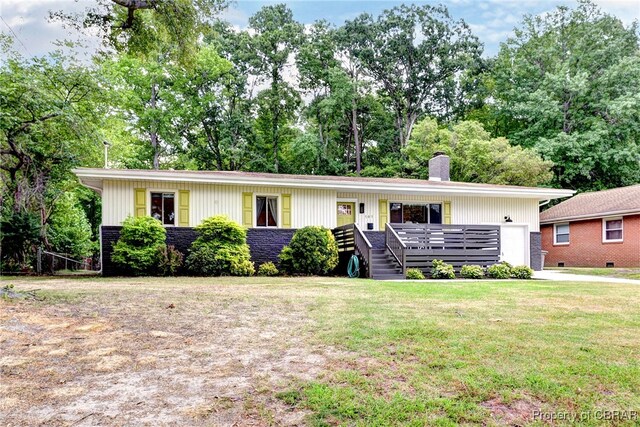 107 Ward, Hampton, VA 23669 - ranch-style house with a front yard, a chimney, stairway, and an attached garage