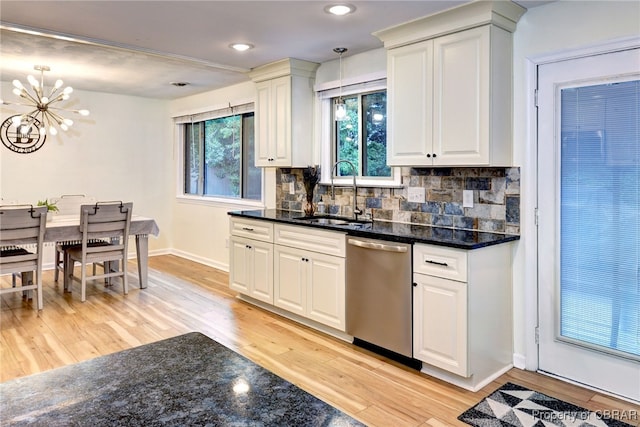 107 Ward, Hampton, VA 23669 - kitchen with dishwasher, light wood finished floors, a chandelier, tasteful backsplash, and hanging light fixtures