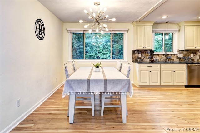 107 Ward, Hampton, VA 23669 - dining room featuring a chandelier and light wood finished floors