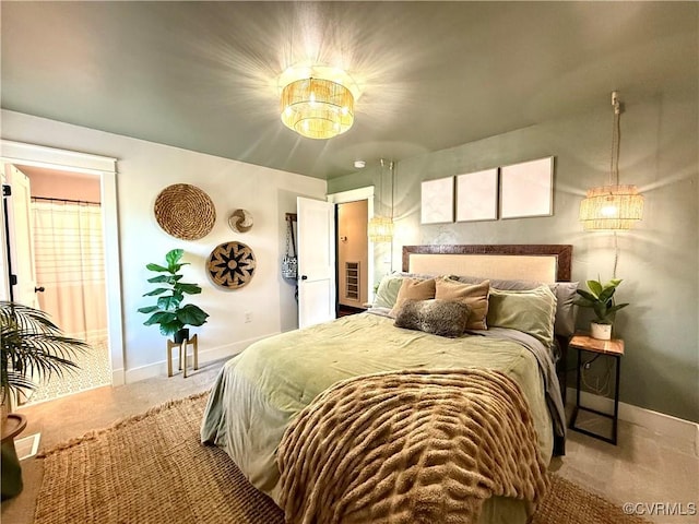 5754 Fox Maple Ter, Chesterfield, VA 23803 - carpeted bedroom with a chandelier and baseboards