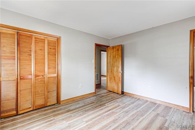 5412 Ridgerun Ter, Chesterfield, VA 23832 - unfurnished bedroom featuring light wood-type flooring and a closet