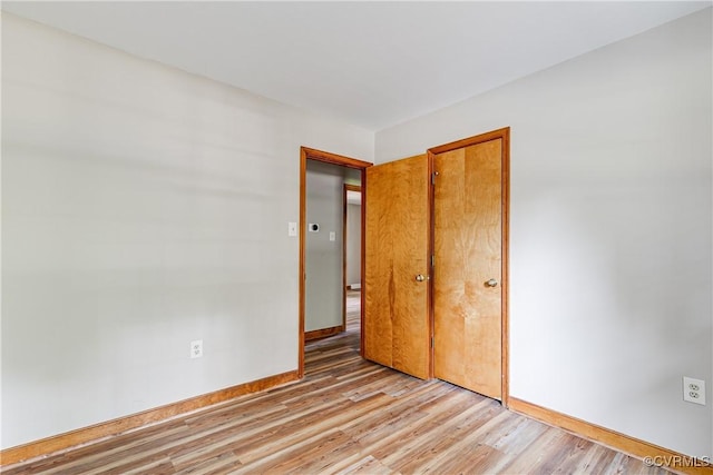 5412 Ridgerun Ter, Chesterfield, VA 23832 - unfurnished bedroom featuring light wood-type flooring and a closet