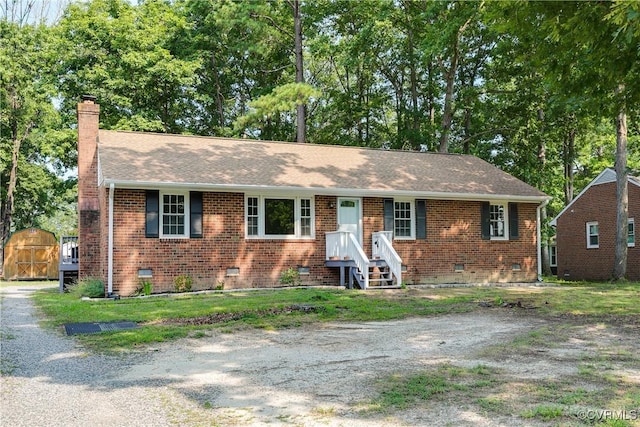 5412 Ridgerun Ter, Chesterfield, VA 23832 - ranch-style house featuring a shed, a chimney, crawl space, roof with shingles, and brick siding