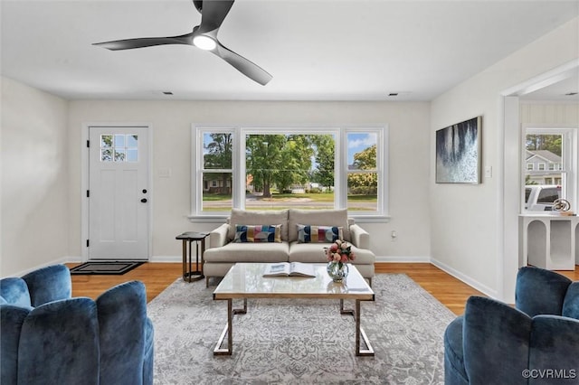 2207 Craven Ln, Henrico, VA 23228 - living room featuring healthy amount of natural light, wood finished floors, and a ceiling fan