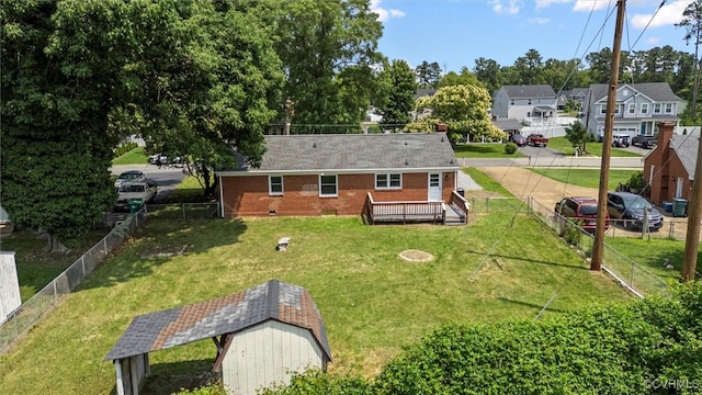 2207 Craven Ln, Henrico, VA 23228 - rear view of property with a fenced backyard, a wooden deck, brick siding, crawl space, and a residential view