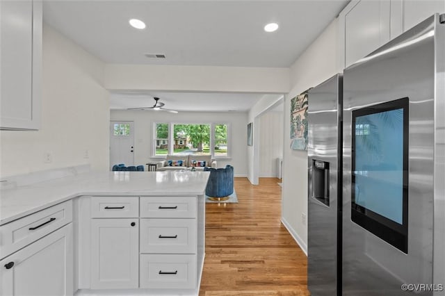 2207 Craven Ln, Henrico, VA 23228 - kitchen with smart refrigerator, light wood-type flooring, white cabinets, and recessed lighting