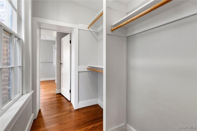 2502 E Grace St, Richmond, VA 23223 - spacious closet featuring dark wood finished floors