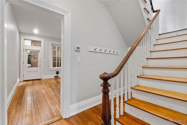 2502 E Grace St, Richmond, VA 23223 - stairway with hardwood / wood-style flooring and vaulted ceiling