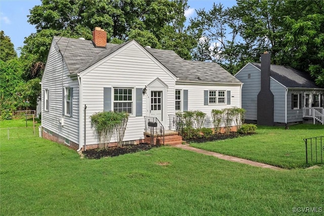914 Kensington Ave, Colonial Heights, VA 23834 - cape cod home featuring a front lawn, a chimney, roof with shingles, and crawl space