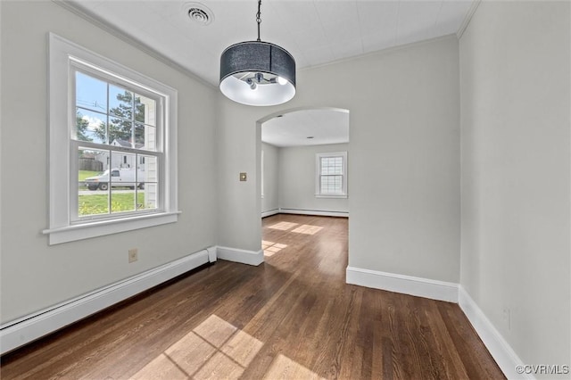 914 Kensington Ave, Colonial Heights, VA 23834 - spare room with a baseboard radiator, wood finished floors, arched walkways, baseboard heating, and ornamental molding