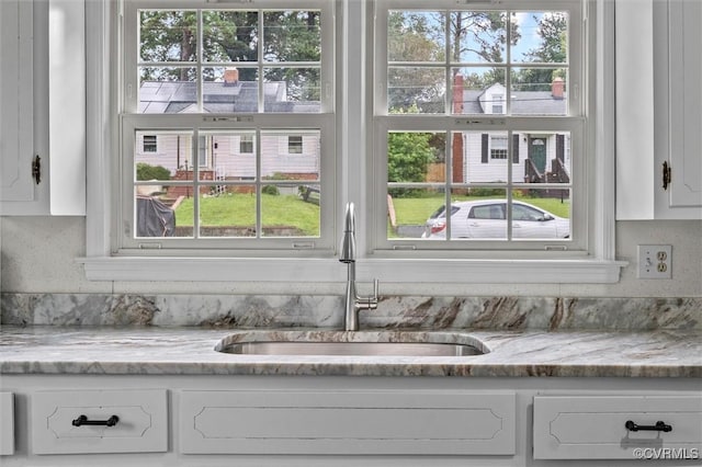914 Kensington Ave, Colonial Heights, VA 23834 - kitchen view of white cabinetry and light stone countertops