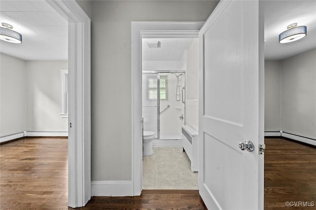 914 Kensington Ave, Colonial Heights, VA 23834 - hallway featuring wood finished floors and baseboard heating