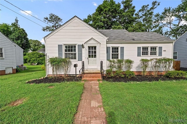 914 Kensington Ave, Colonial Heights, VA 23834 - view of front of house with a front yard and roof with shingles