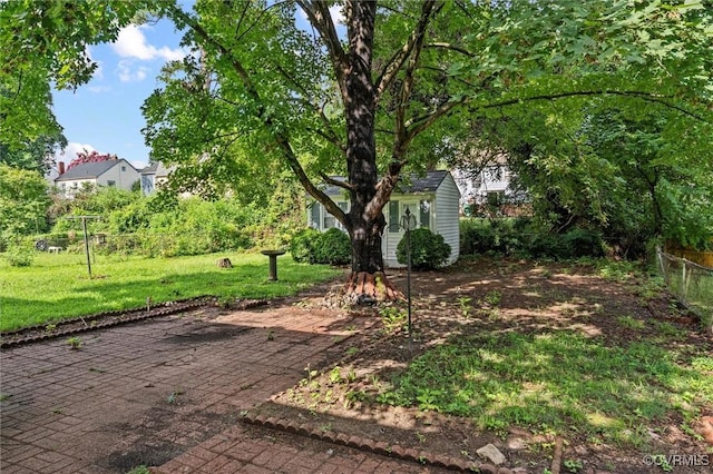 914 Kensington Ave, Colonial Heights, VA 23834 - view of yard featuring an outdoor structure and a patio